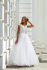 Young beautiful girl in ballroom prom dress