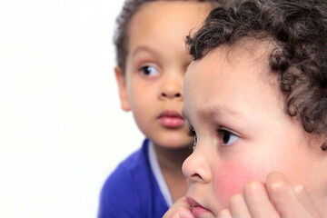 boy looking straight ahead on white background stock photo