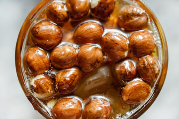 Honey nuts. Mixed nuts in honey. Syrup