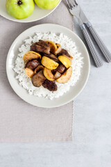 Fried chicken liver with apples and onions