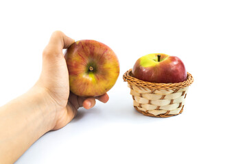 Red apple in a basket cute photo on white isolated background