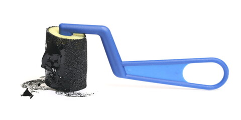 Decorative sponge roller with black dye isolated on white background