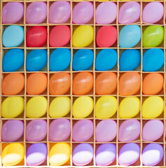 Shooting gallery with color balloons in cells in entertainment park