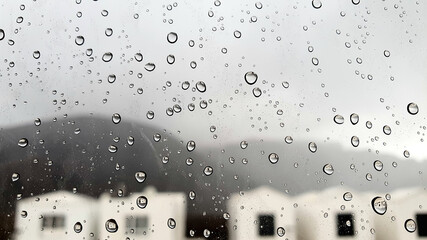 rain drops on a window, black and white