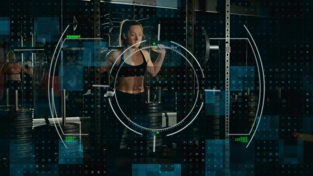 Scope scanning and digital processing against woman performing squat exercise at the gym - Powered by Adobe