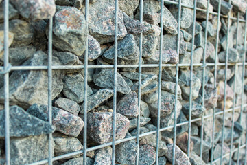 gray stones behind bars near 