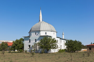 Fototapeta na wymiar View from the Evpatoria highway to the Yany Jami mosque in the city of Saki, Crimea