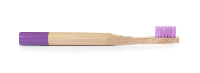 Bamboo toothbrush for children isolated on white. Dental care
