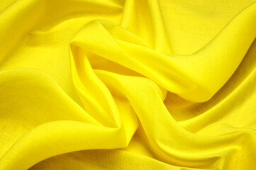 Bright yellow cotton fabric with added elastane for blouses.