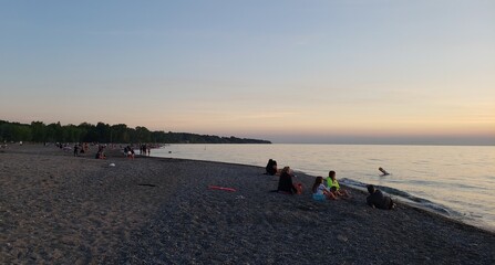 Waiting for sunset on the beach at the lake