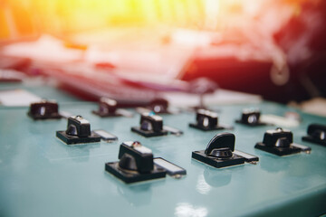 Close-up of buttons and switches control panel of nuclear power plant