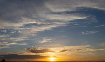 The evening sunset. Panorama. Majestic Storm Clouds. Tragic gloomy sky.