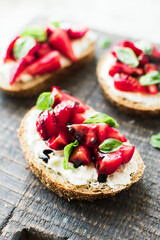Sandwich with strawberries, soft cheese and balsamic vinegar