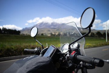 panorama view of the mighty volcano chimborazo in ecuador with motorcycle