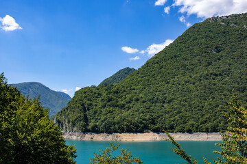 The famous Piva river canyon with its fantastic reservoir Piva Lake (Pivsko Jezero) summer view in Montenegro. Nature travel background.