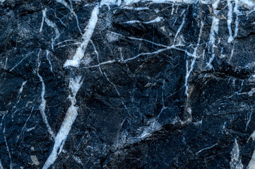 Black marble, natural pattern for background, exotic abstract limestone marble, part mineral granite stone, Copy space