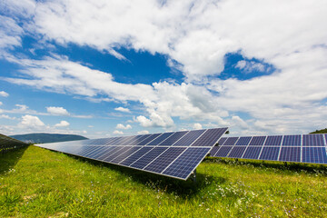 Aerial view of Solar panel, photovoltaic, alternative electricity source - concept of sustainable resources on a sunny day