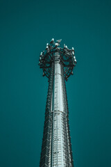 Cell tower against the blue sky