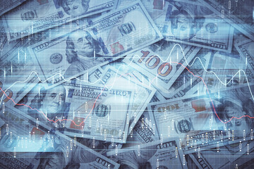 Fototapeta premium Double exposure of forex graph drawing over us dollars bill background. Concept of financial markets.