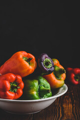 Fresh bell peppers in bowl