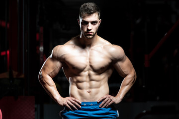 Fototapeta na wymiar Strong Bodybuilder With Six Pack