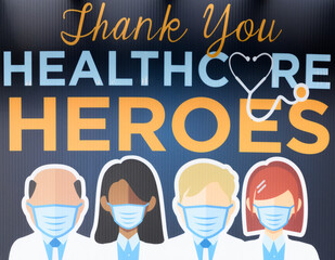 Sign honoring healthcare workers with masked faces
