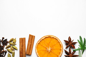 Different mulled wine ingredients on white background, flat lay. Space for text