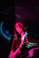 Abstract photography in the style of light painting. girl on a black background	
