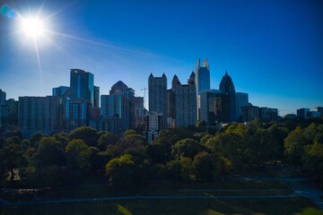 Beautiful aerial shot of Piedmont park and Atlanta skyline shot during golden hour by drone