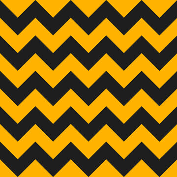 Zig zag Halloween pattern. Regular chevron stripes of black and yellow color. Classic zigzag lines abstract geometry background. Seamless texture print. Vector illustration
