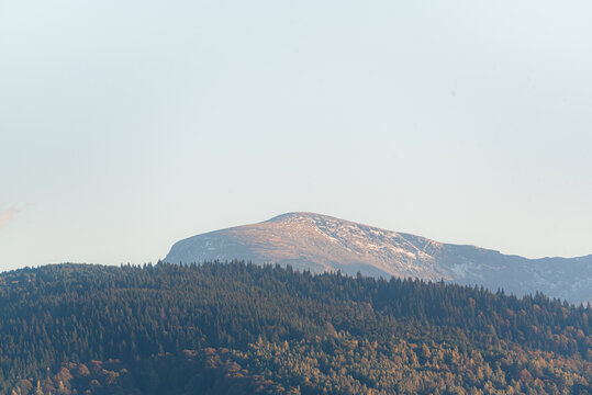 clear blue air over mountains in bulgaria crops hay fields clouds blue sharp focus distance superzoom copy space for text minimal landscape rural