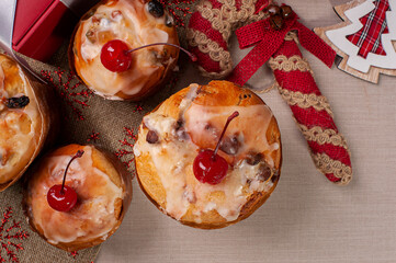 .Delicious Christmas dessert, homemade mini panettone with fruits, nuts