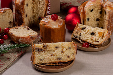 .Delicious Christmas dessert, mini panettone and homemade chocotone with fruits, nuts and chocolate