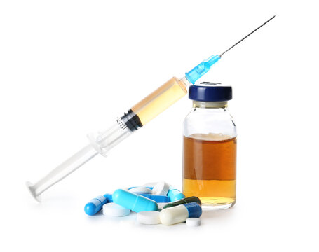 Syringe with drugs on white background