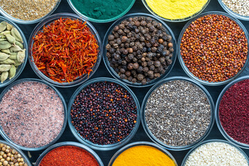 Assortment colorful spices, seeds and herbs for cooking food, top view