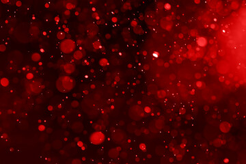 Red bokeh defocus abstract background. Festive Christmas or New Year lights. Glitter twinkled banner