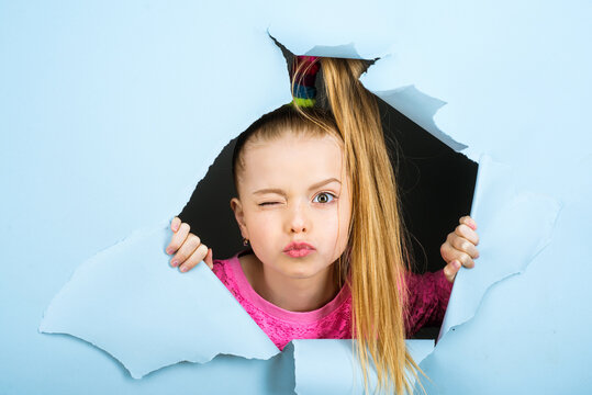 Funny Child Little Girl Wink, Isolated. Happy Kids Winking Face. Paper Hole Banner.