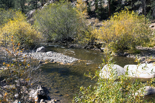 Pecos River in autumn in the Santa Fe National Forest of New Mexico is a great place to hike along the water and beautiful rocks