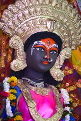 Closeup of face of Goddess Durga, Idol of goddess Durga, hindu festival navratri.