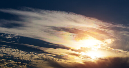 Sun in Beautiful Cirrus Clouds at Sunset.