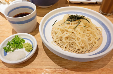 Close up Japanese Cold Noodle or Zaru Ramen on Wooden Table