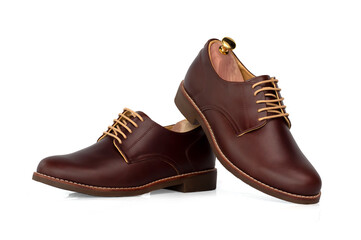 Men fashion brown shoes leather with shoe tree (shape supporter)  isolated on white background.
