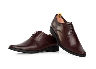 Men fashion yellow leather oxford shoes with shoe tree (shape supporter) isolated on white background.