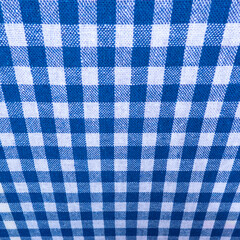 Close up of blue and white cross pattern and texture, as distorted chess table. blue and white chess table.