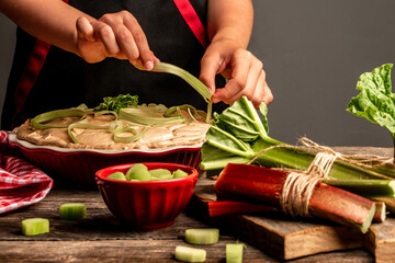 Homemade organic traditional rhubarb pie on wooden rustic table. Fresh baked rhubarb pie in the...