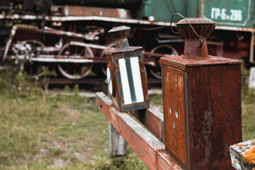 Fototapeta na wymiar Metal rusted box of the railway of the last century attribute. Selective focus.