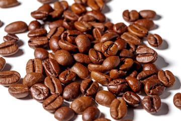 Heap of fresh roasted coffee beans isolated on white background as package design elements