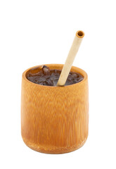 Iced americano coffee in bamboo cup with small bamboo straw inside isolated on white background