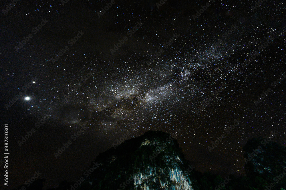Wall mural noise backgrounds night sky with stars and milky way at thailand