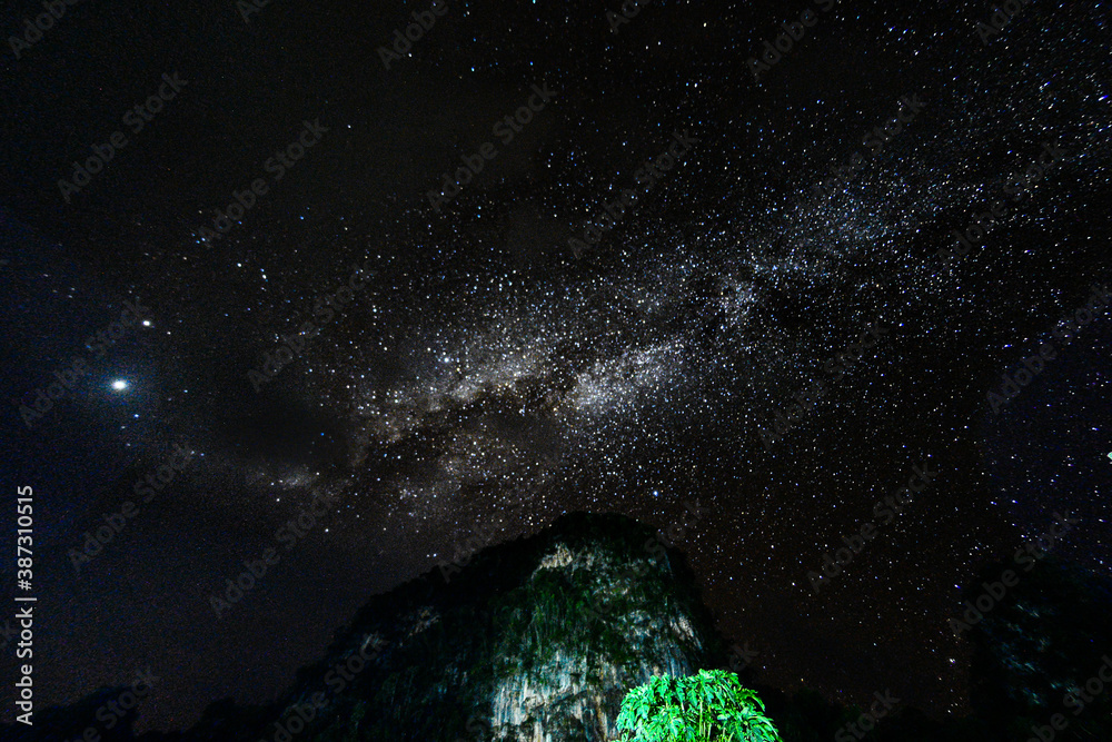 Wall mural noise backgrounds night sky with stars and milky way at thailand